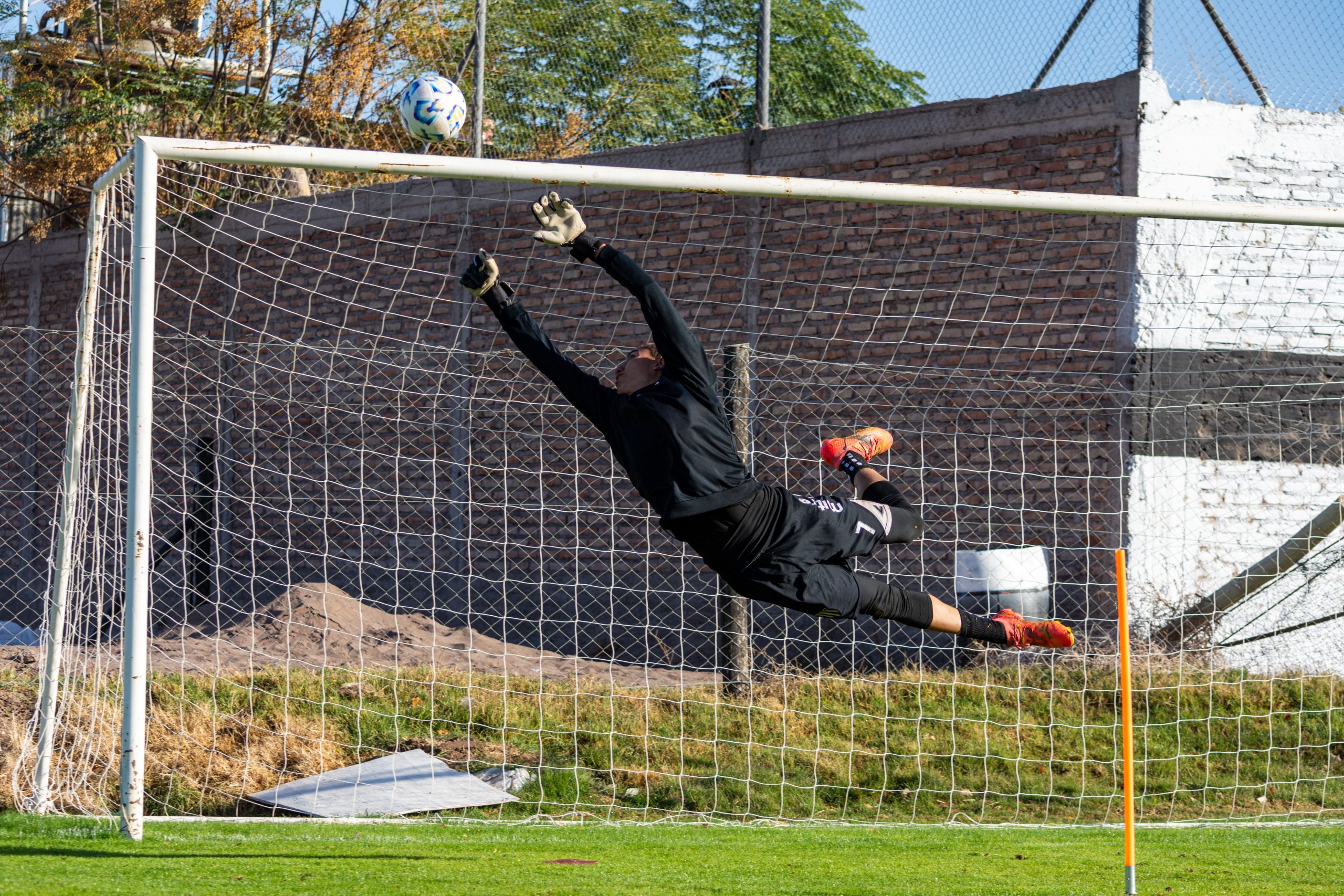 Goalkeeper reacting to a goal that changes the score, illustrating how half-time/full-time betting outcomes can shift